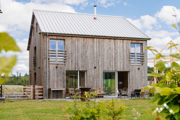 Ecologisch chalet voor 10 personen vlakbij Gesves met sauna en ontspanningsruimte 